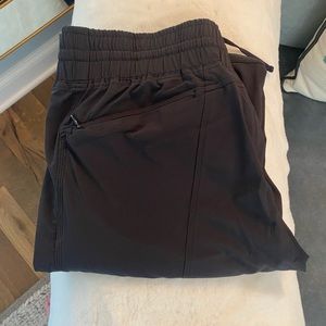Athleta, size 6, black joggers.  Adjustable drawstrings at waist and ankles.